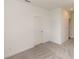 Spacious bedroom with neutral wall paint and carpeted floor at 1442 Casteel Lake Ln # 277, Buford, GA 30518