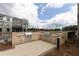 Community grilling area with two built-in grills and a spacious countertop at 1442 Casteel Lake Ln # 277, Buford, GA 30518