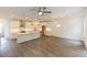 Open-concept living space with a kitchen featuring a center island, perfect for entertaining at 1442 Casteel Lake Ln # 277, Buford, GA 30518