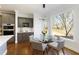 Breakfast nook with glass table and view of backyard at 5142 Parkwood Oaks Ln, Mableton, GA 30126