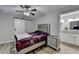 Main bedroom with sliding barn door and ensuite bathroom at 1606 Fieldgreen Overlook, Stone Mountain, GA 30088