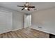 Bright bedroom with double door closet and ceiling fan at 1606 Fieldgreen Overlook, Stone Mountain, GA 30088