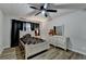 Cozy bedroom with ceiling fan and white dresser at 1606 Fieldgreen Overlook, Stone Mountain, GA 30088