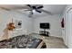 Bright bedroom with a plush bed, dresser, and TV at 1606 Fieldgreen Overlook, Stone Mountain, GA 30088
