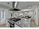 Modern kitchen with stainless steel appliances and granite countertops at 1606 Fieldgreen Overlook, Stone Mountain, GA 30088