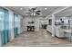 Spacious living room with hardwood floors, ceiling fan and open floorplan at 1606 Fieldgreen Overlook, Stone Mountain, GA 30088