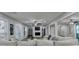 Spacious living room with hardwood floors, fireplace and large windows at 1606 Fieldgreen Overlook, Stone Mountain, GA 30088