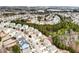 Aerial view of houses, neighborhood, and pond at 1567 Brunswick St, Lithia Springs, GA 30122