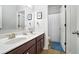 Bathroom with double vanity and shower at 1567 Brunswick St, Lithia Springs, GA 30122