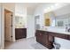 Elegant bathroom with double vanity and large mirror at 1567 Brunswick St, Lithia Springs, GA 30122