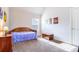 Charming bedroom with wooden daybed and storage at 1567 Brunswick St, Lithia Springs, GA 30122