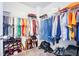 Spacious walk-in closet with ample shelving and hanging space at 1567 Brunswick St, Lithia Springs, GA 30122