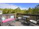 Relaxing deck with wooded views and seating at 1567 Brunswick St, Lithia Springs, GA 30122