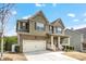 Two story house with brick and siding exterior at 1567 Brunswick St, Lithia Springs, GA 30122