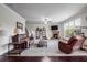 Spacious living room with fireplace and large windows at 1567 Brunswick St, Lithia Springs, GA 30122