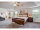 Spacious main bedroom with large bed and high ceiling at 1567 Brunswick St, Lithia Springs, GA 30122