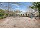 Community playground with playset and clubhouse at 1567 Brunswick St, Lithia Springs, GA 30122