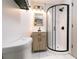 Modern bathroom with a walk-in shower and new vanity at 2105 Fellowship Rd, Tucker, GA 30084