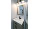 Modern bathroom with vanity and updated lighting at 2105 Fellowship Rd, Tucker, GA 30084