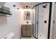Updated bathroom with a walk-in shower and new vanity at 2105 Fellowship Rd, Tucker, GA 30084
