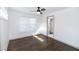 Spacious bedroom with hardwood floors and ceiling fan at 2105 Fellowship Rd, Tucker, GA 30084