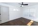 Bright bedroom with hardwood floors and ceiling fan at 2105 Fellowship Rd, Tucker, GA 30084