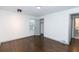 Well-lit bedroom with hardwood floors and closet at 2105 Fellowship Rd, Tucker, GA 30084