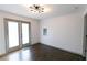 Bright dining room with hardwood floors and French doors at 2105 Fellowship Rd, Tucker, GA 30084