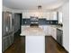 Modern kitchen with stainless steel appliances and granite countertops at 2105 Fellowship Rd, Tucker, GA 30084