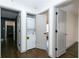 Bright laundry room with washer and dryer; stackable, in-closet unit at 2105 Fellowship Rd, Tucker, GA 30084
