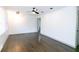 Bright living room with hardwood floors and ceiling fan at 2105 Fellowship Rd, Tucker, GA 30084