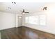 Bright living room with hardwood floors and ceiling fan at 2105 Fellowship Rd, Tucker, GA 30084