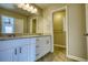 Double vanity bathroom with granite countertops at 3856 Woodyhill Dr, Lithonia, GA 30038