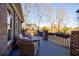 Relaxing deck with wicker furniture, offering a view of the backyard at 2406 Greenglade Ne Rd, Atlanta, GA 30345