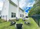 Fenced backyard with patio and seating area, perfect for relaxation at 320 Kentshire, Lawrenceville, GA 30044