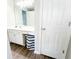 Clean bathroom with a vanity, sink, and linen closet at 320 Kentshire, Lawrenceville, GA 30044