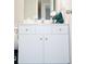 White bathroom vanity with drawers and a countertop at 320 Kentshire, Lawrenceville, GA 30044