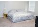 King-size bedroom with hanging lights and a small side table at 320 Kentshire, Lawrenceville, GA 30044