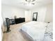 Large bedroom with a dresser, king bed, and ceiling fan at 320 Kentshire, Lawrenceville, GA 30044