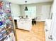 Bright kitchen features an island and dining area at 320 Kentshire, Lawrenceville, GA 30044