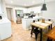 Eat-in kitchen with stainless steel appliances and wood flooring at 320 Kentshire, Lawrenceville, GA 30044