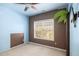 The interior of a well-decorated bedroom with interesting wall features and decor at 120 Fountain Oak, Villa Rica, GA 30180