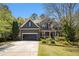 Charming two-story home with a well-manicured lawn, two car garage and inviting front porch at 120 Fountain Oak, Villa Rica, GA 30180