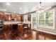 Bright kitchen featuring stainless steel appliances, granite counters, and hardwood floors at 120 Fountain Oak, Villa Rica, GA 30180
