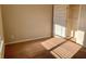 Bedroom with neutral carpet, neutral colored walls and natural light from a window at 1370 Long Acre Dr, Loganville, GA 30052