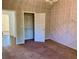 Bedroom with neutral carpet, neutral colored walls and decorative trim at 1370 Long Acre Dr, Loganville, GA 30052