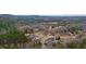 Community overview with wooded areas and homes at 65 Centerport Dr, White, GA 30184