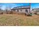 Spacious backyard with deck and lawn at 65 Centerport Dr, White, GA 30184