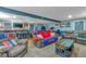 Finished basement with bar, seating area, and home gym at 65 Centerport Dr, White, GA 30184