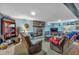 Finished basement with stone fireplace and comfortable seating at 65 Centerport Dr, White, GA 30184